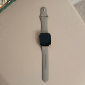 Apple Smartwatch with Gray Band and Gold Case